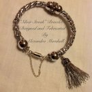 "Silver Streak" Silver Braided Leather Crystal and Silver Tassel Bracelet $59