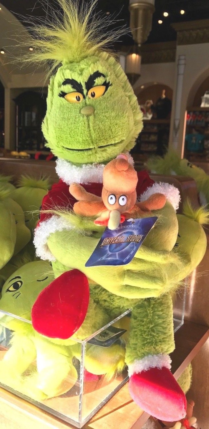 grinch plush gift set with removable santa suit