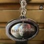 Universal Studios Exclusive Silver Spinning Metal Keychain New