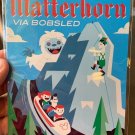 Disney WonderGround Zip On Down The Majestic Matterhorn Postcard by Dave Perillo