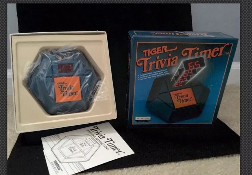 New Trivia Timer Tiger Electronics. It is COMPLETE with Box, box liner, Timer,
