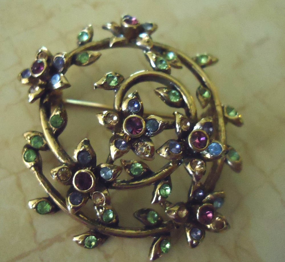 VINTAGE BROOCHSIGNED WITH MULTI COLORED RHINESTONES/FLOWERS