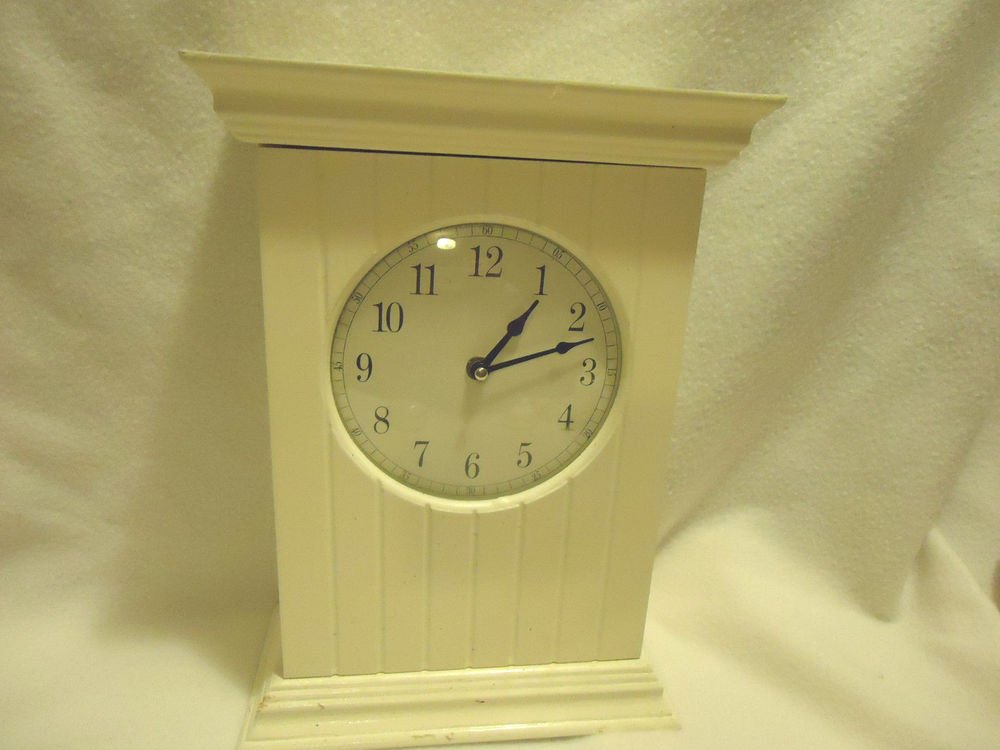 SOLID WOOD WHITE MANTEL CLOCK..FRONT OPENS WITH TWO STORAGE SHELVES...LARGE