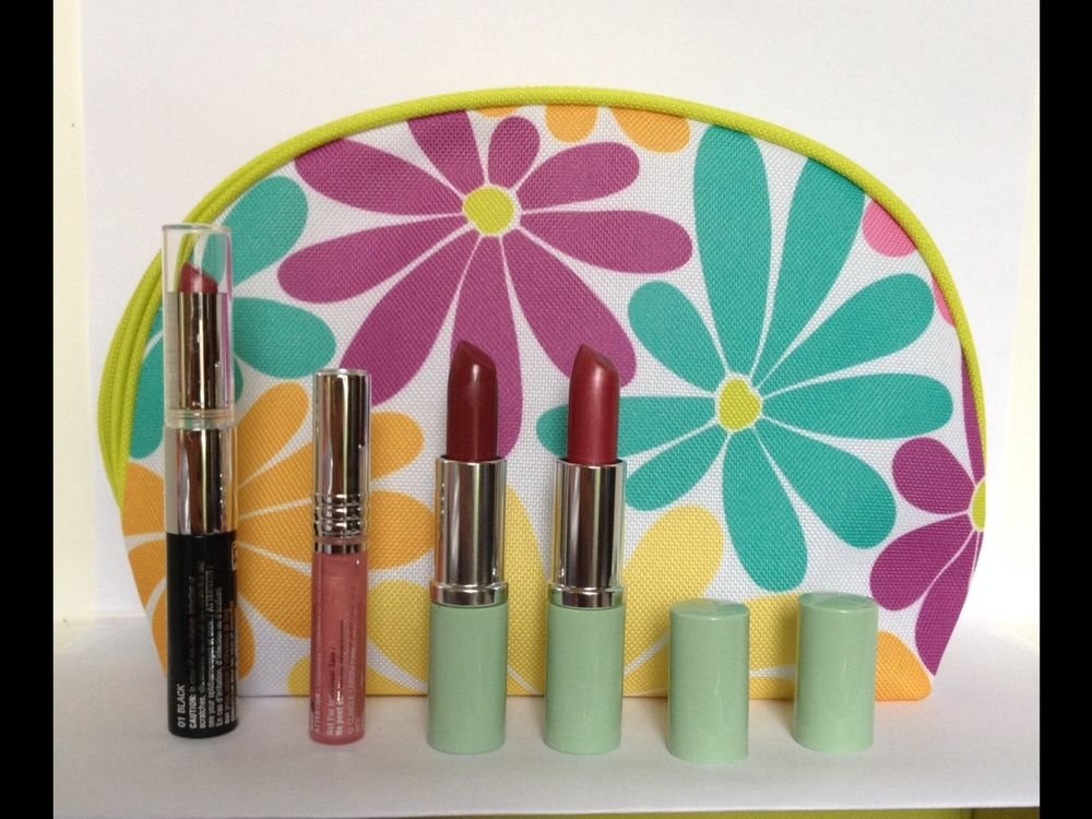 4pc Clinique Lipstick & Lipgloss + Bag