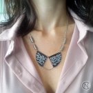 Necklace with black shrink plastic pendants and beads