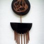 Necklace with two black shrink plastic pendants and chains