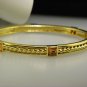JUDITH RIPKA 18K YELLOW GOLD  CITRINE OVAL BANGLE BRACELET.