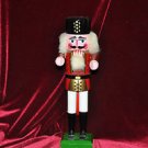 NUT CRACKER HOLIDAY SOLDIER,,WHITE,RED, BLACK AND GREEN 13''TALL