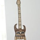 WOODEN TIKI GUITAR WALL DECOR IS 38''TALL BY 10''WIDE MADE IN INDONESIA