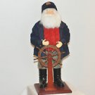 Nautical Captain figurine steering the Boat