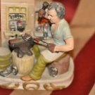 Ceramic Horse Shoe Maker Figurine Burt Reynold look alike 7''Tall Mixed Material