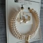 Christina Collection Three Strand Pearl Necklace and Dangling Earring Set Cream Steel in Gold Tone