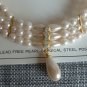 Christina Collection Three Strand Pearl Necklace and Dangling Earring Set Cream Steel in Gold Tone