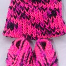 Pink baby booties and hat set