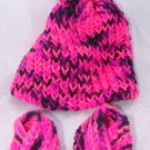 Pink baby booties with pompom hat set