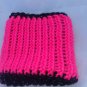 Pink and black reversible bottle/can koozie