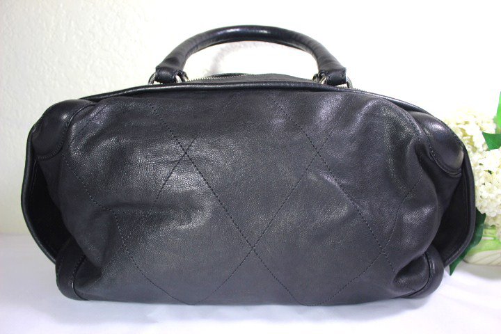 Chanel Black Quilted Leather Barrel Duffel Travel Hand Bag Handbag Italy