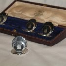 A sterling solid silver Goldsmiths Cased four piece Place Card Holders