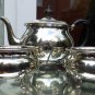 Antique Silver Plate: A three piece Teaset - early 20thC