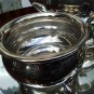 Antique Silver Plate: A three piece Teaset - early 20thC