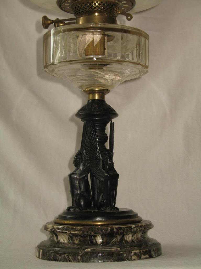 An impressive and substantial Egyptian Revival double duplex burner Oil