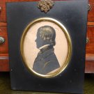 Antique Silhouette :Georgian bronzed portrait of a Gentleman on plaster 19thC