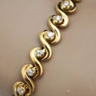 ELEGANT 14K YELLOW GOLD & 1.12 TCW DIAMOND SWIRL TENNIS BRACELET 16.2 GRAMS ~NEW