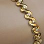 ELEGANT 14K YELLOW GOLD & 1.12 TCW DIAMOND SWIRL TENNIS BRACELET 16.2 GRAMS ~NEW