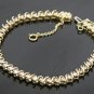 ELEGANT 14K YELLOW GOLD & 2.2CT ROUND DIAMOND SWIRL TENNIS BRACELET 7.25" 11.2GR