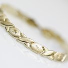 BEAUTIFUL 14K SOLID YELLOW GOLD X LINK TENNIS BRACELET - 8" LENGTH 6.6GRAMS