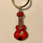 Six Flags Magic Mountain Loone Tunes Daffy Duck Guitar Shape Keychain New