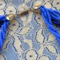Necklace of a mass of pale blue colored small beads, Triple stand necklace, cheap, silver colored fi