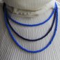 Necklace of a mass of pale blue colored small beads, Triple stand necklace, cheap, silver colored fi
