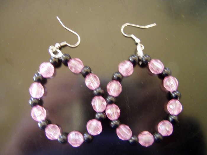 pink and black cirlced earrings
