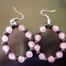 pink and black cirlced earrings