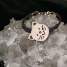 Brown Hemp woven on Hemp with a Tan Kitty Button w/Metal Clasp
