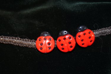 Handcrafted Black Hemp with 3 Ladybugs finished with a metal closure