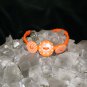 Orange Handcrafted Hemp with 3 buttons and metal closure
