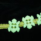Green Handmade Hemp Bracelet with 3 Turtles and a Metal Closure