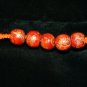 Orange Handcrafted Hemp with 5 wooden Beads and Metal Closure