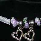 Blue Handcrafted Bracelet with 2 Black bead and 2 Heart Charms and Metal Closure