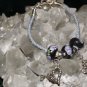 Blue Handcrafted Bracelet with 2 Black bead and 2 Heart Charms and Metal Closure