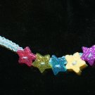 Blue Handcrafted Bracelet with 6 Multi-Colored Stars and Metal Closure