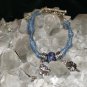 Blue Handcrafted Bracelet with 1 Ceramic Blue Bead and 2, 4 Leaf Clover Charms and Metal Closure