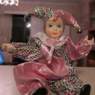 Clown Doll 10" Porcelain face, legs and arms with pink costume, collectible item