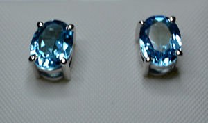Pure .925 Sterling Silver Solid Studs Earrings Studded with Blue Topaz Oval