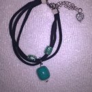 THREE STRAND TURQUOISE AND BLACK CHARM BRACELET