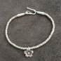 FINE SILVER BRACELET 999 TRIBAL CRAFT VINTAGE 6.5g MINIMAL FLOWER CHARMS #48