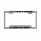 THIS VEHICLE IS INSURED BY SMITH AND WESSON License Plate Frame Vehicle Heavy Duty Metal THIS VEHICLE IS INSURED BY SMITH AND WESSON License Plate Frame Vehicle Heavy Duty Metal