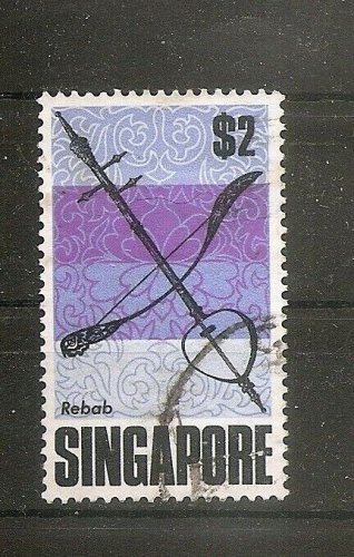 SINGAPORE  $2 Malay instrument Scott 109 SG 113 Fine Used